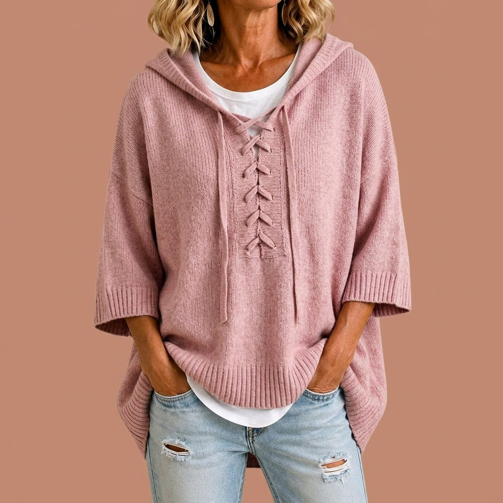 Rosabel | Brede gebreide poncho met capuchon detail